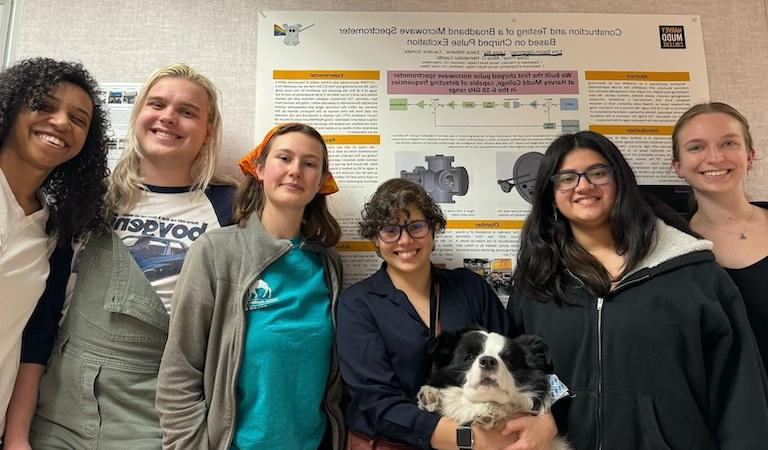 Prof. Hernandez-Castillo spring research students standing in a group with Hamilton - service dog